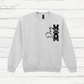 Gray sweatshirt with a black graphic design on a white wooden background