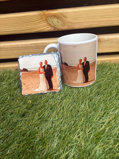 Two mugs with a printed design of a person on a grassy surface