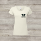 White t-shirt with a dog graphic and text on a wooden surface