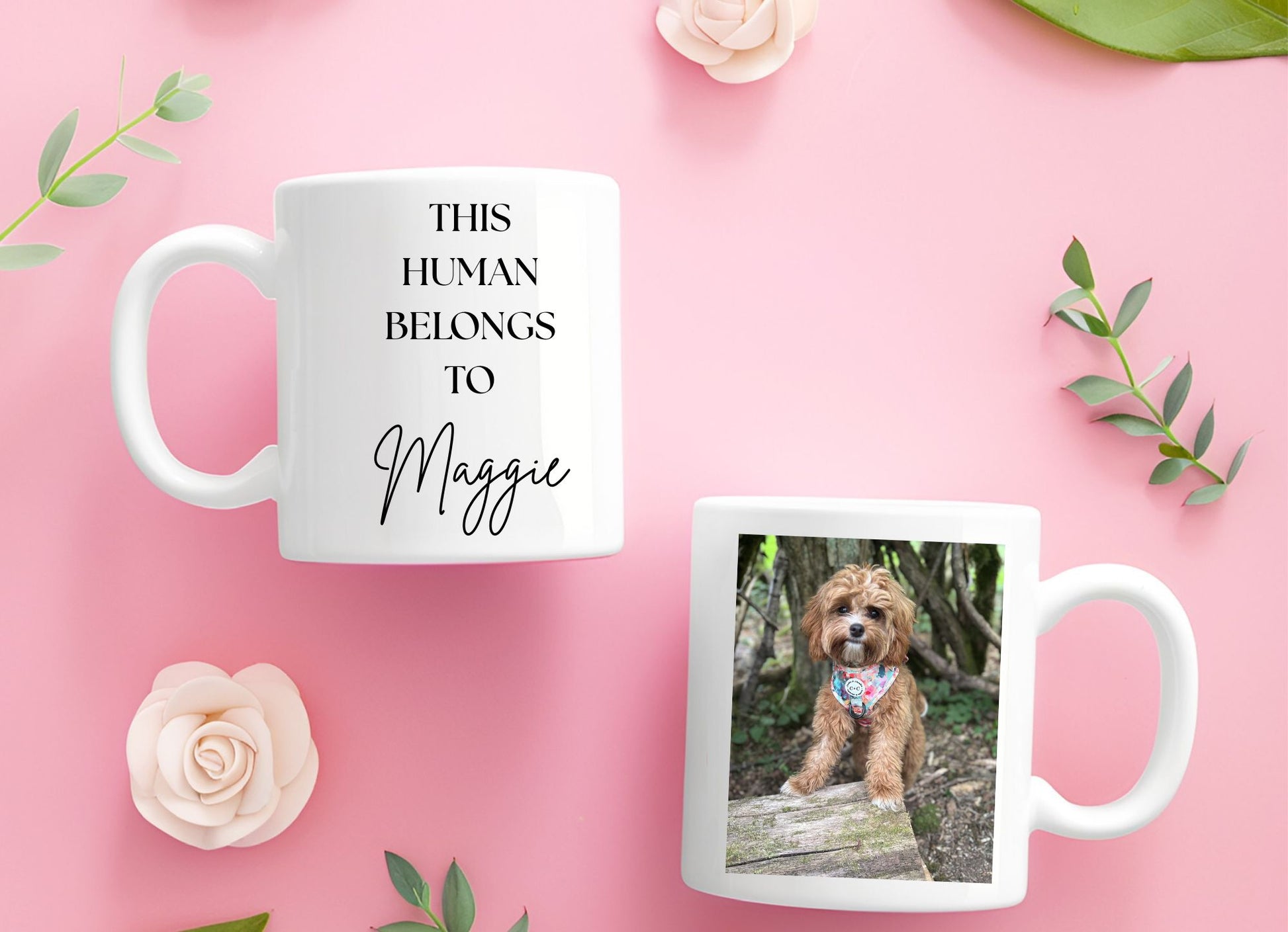Two mugs on a pink background with one displaying text and the other with a dog photo.