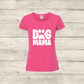Pink t-shirt with 'Dog Mama' text on a wooden surface