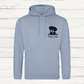 Light blue hoodie with a dog graphic and text on a wooden background