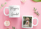 Two mugs on a pink background with one displaying 'Maggie's Grandad' text and the other featuring a dog photo.