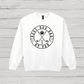 White sweatshirt with 'Best Dog Dad by Par' text on a wooden surface
