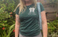 green t shirt with dog outline in white