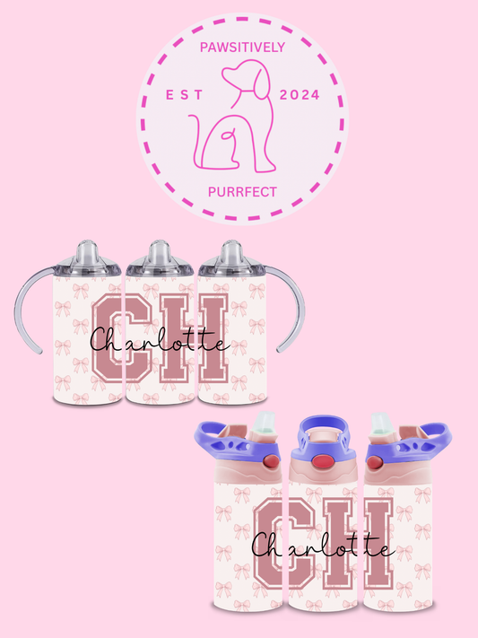Two sippy cups and two water bottles with 'CH' and 'Charlotte' on a pink background, featuring a logo at the top.