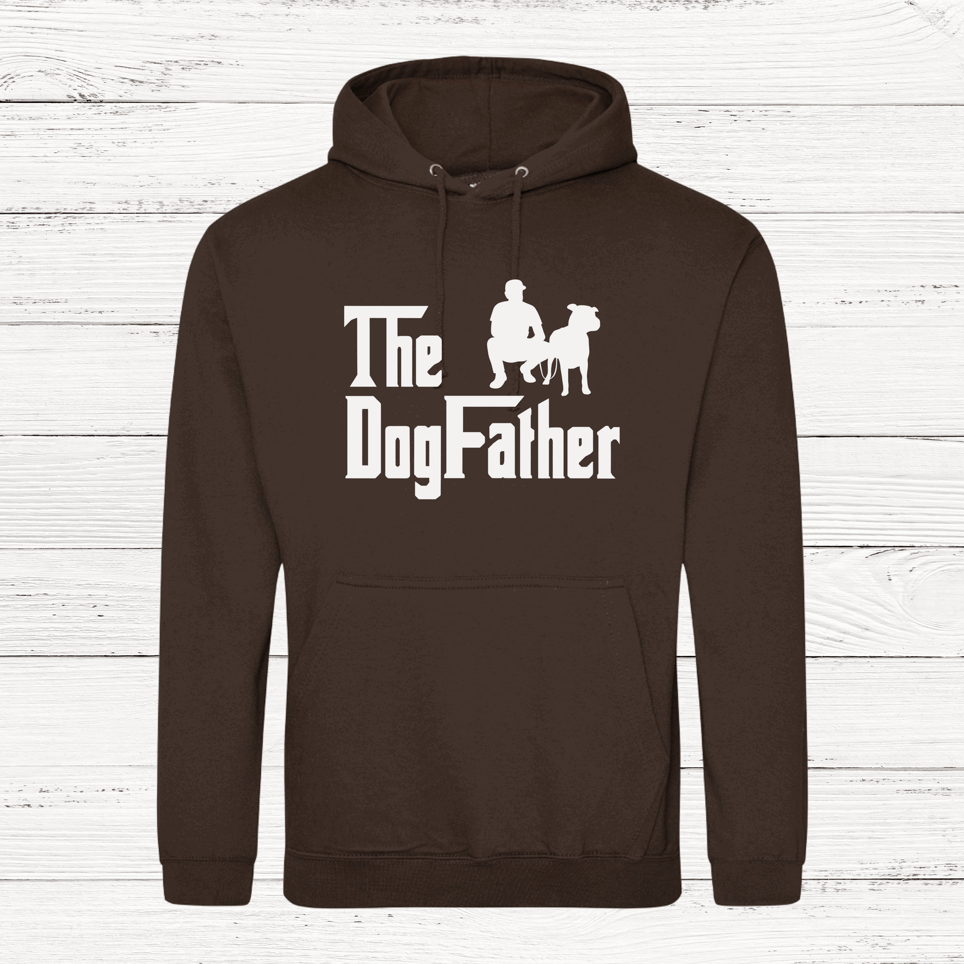 Brown hoodie with 'The Dogfather' text and graphic on a wooden background