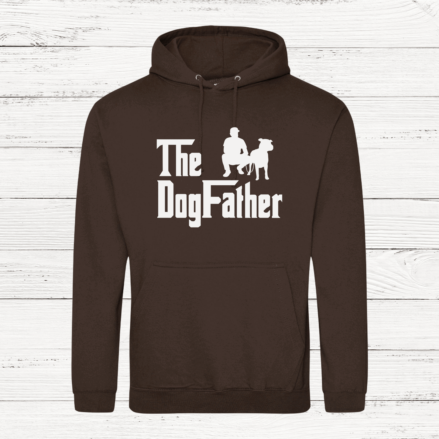Brown hoodie with 'The Dogfather' text and graphic on a wooden background