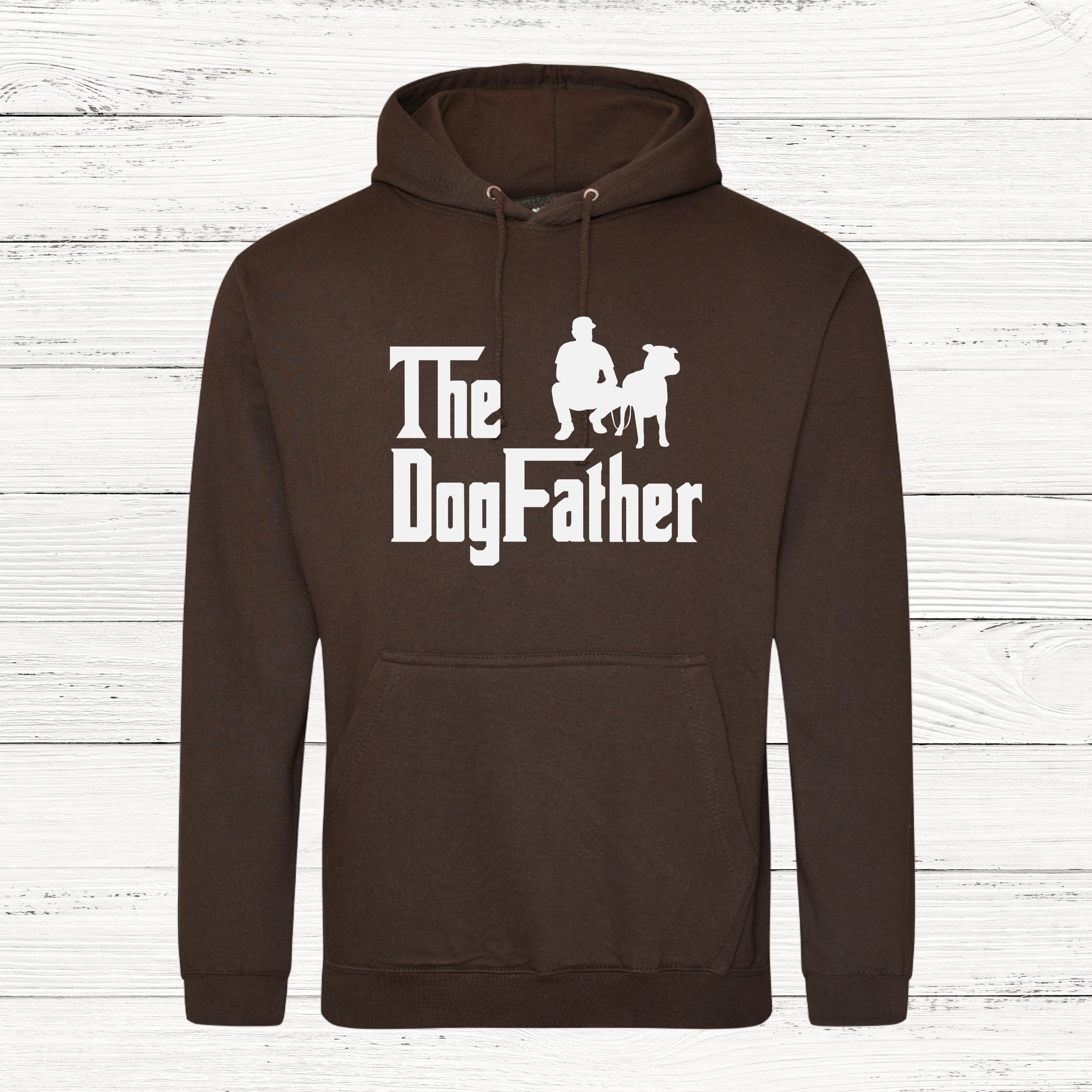 Brown hoodie with 'The Dogfather' text and graphic on a wooden background