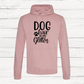 Pink hoodie with 'Dog hair is my Glitter' text on a wooden background