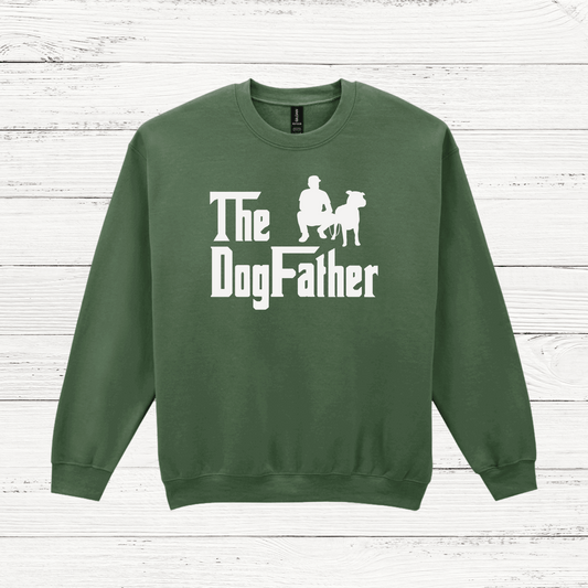 Green sweatshirt with 'The Dog Father' text and graphic on a wooden surface