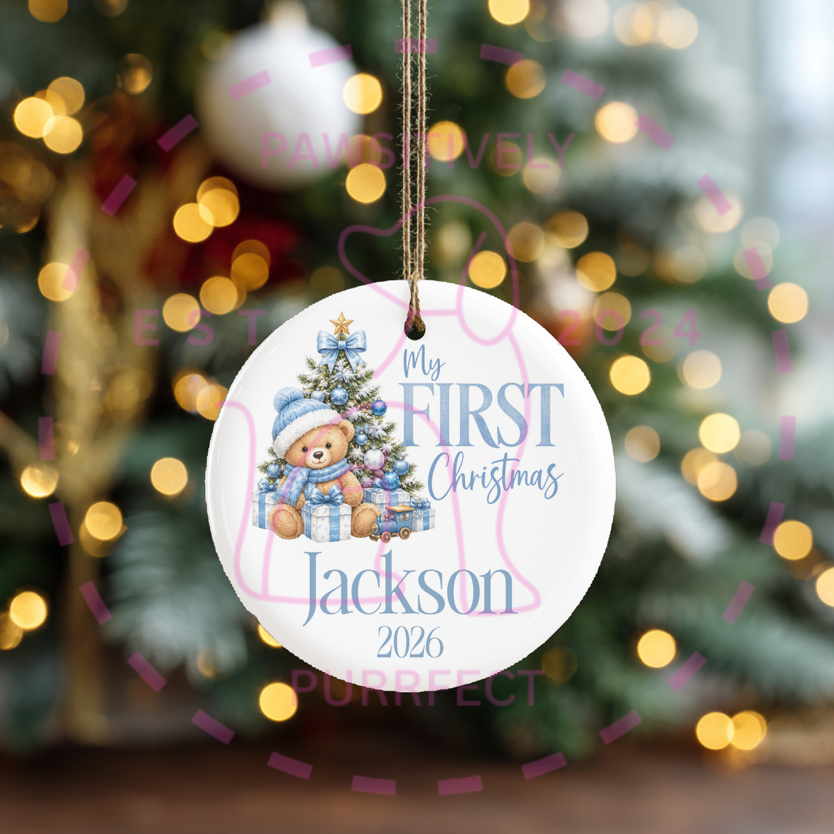 Personalised teddy bear Christmas decoration with baby's details.
