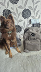 Personalised dog backpack with name and paw print design
