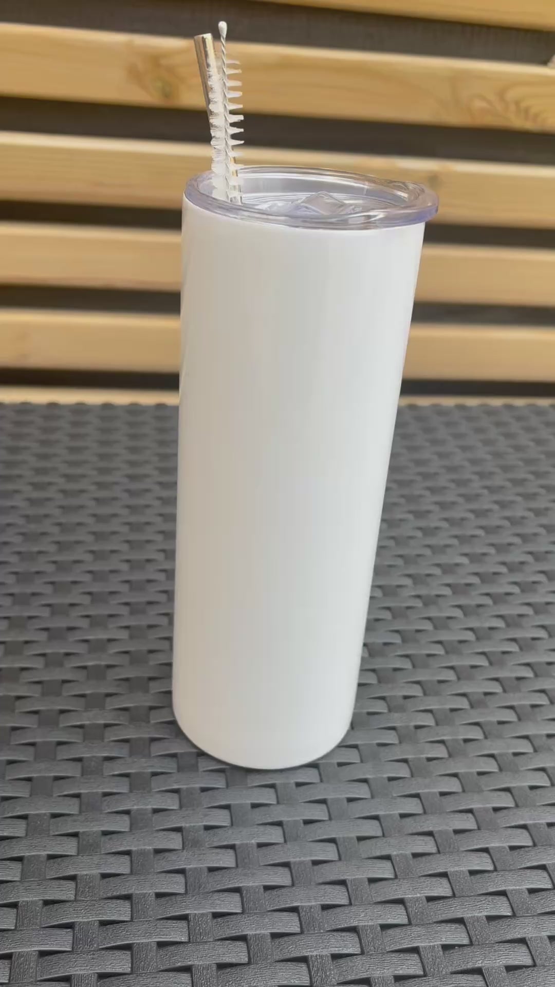 video showing a blank tumbler including the lid and straw