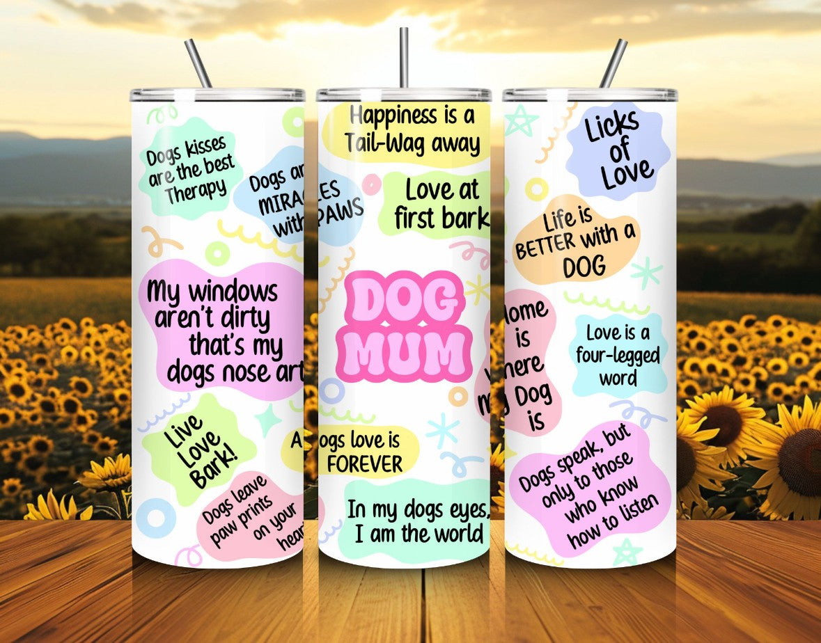 Three tumblers with dog-themed sayings on a wooden surface with a sunflower field background.
